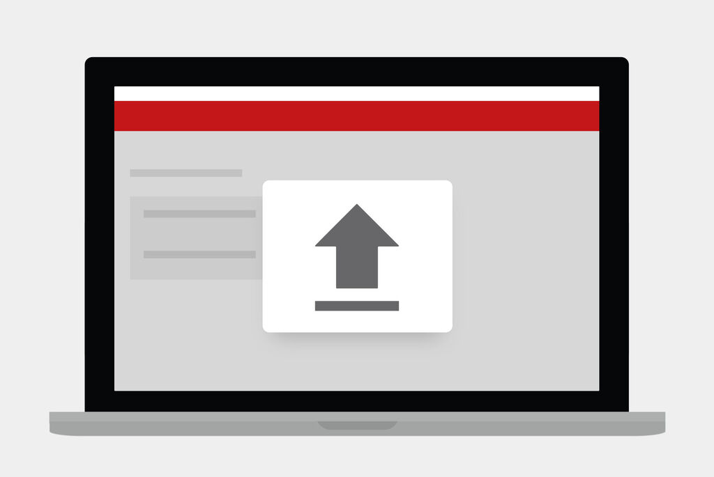 Laptop ukazuje symbol na odoslanie na šedom pozadí.
