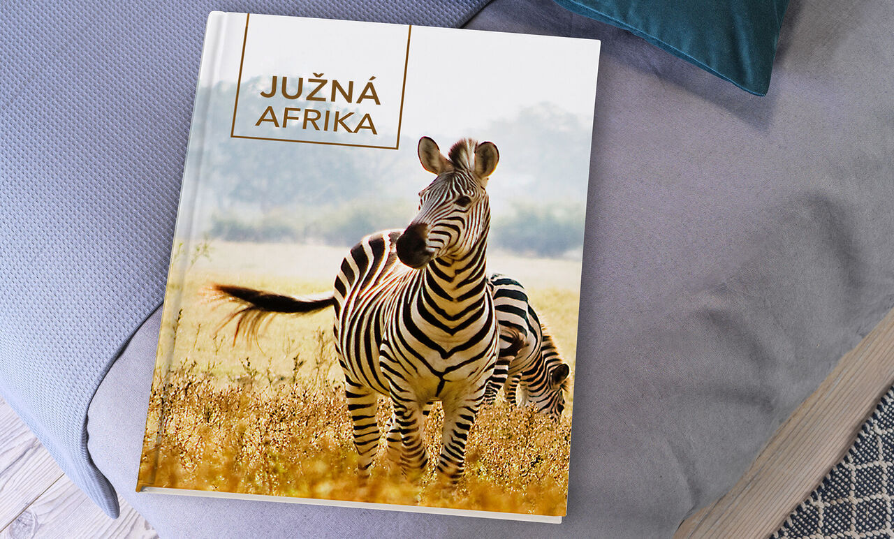 CEWE Fotokniha so zebrami v africkej krajine.