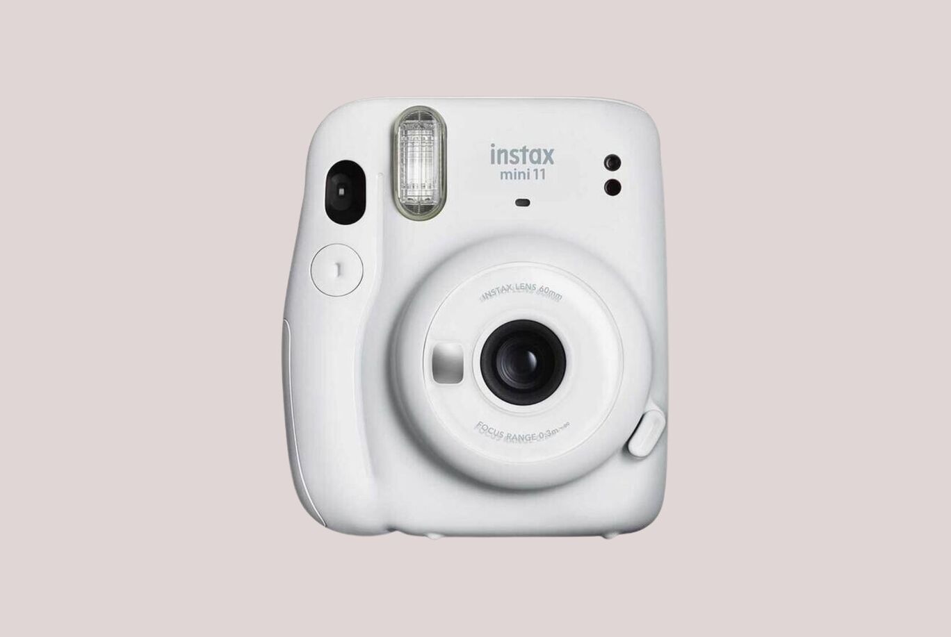 Kamera Instax Mini 11 v bielej na svetlom pozadí.
